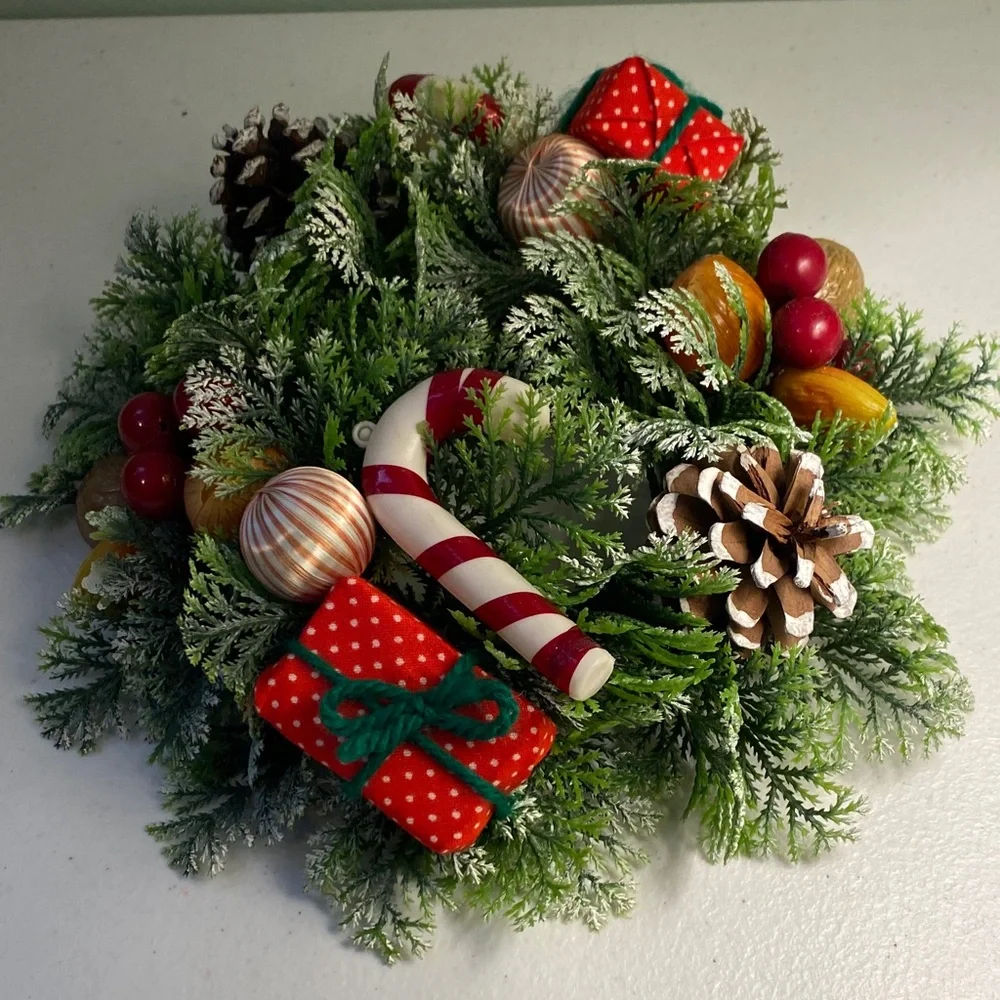 Festive Holiday Candle Wreath with Red Accents